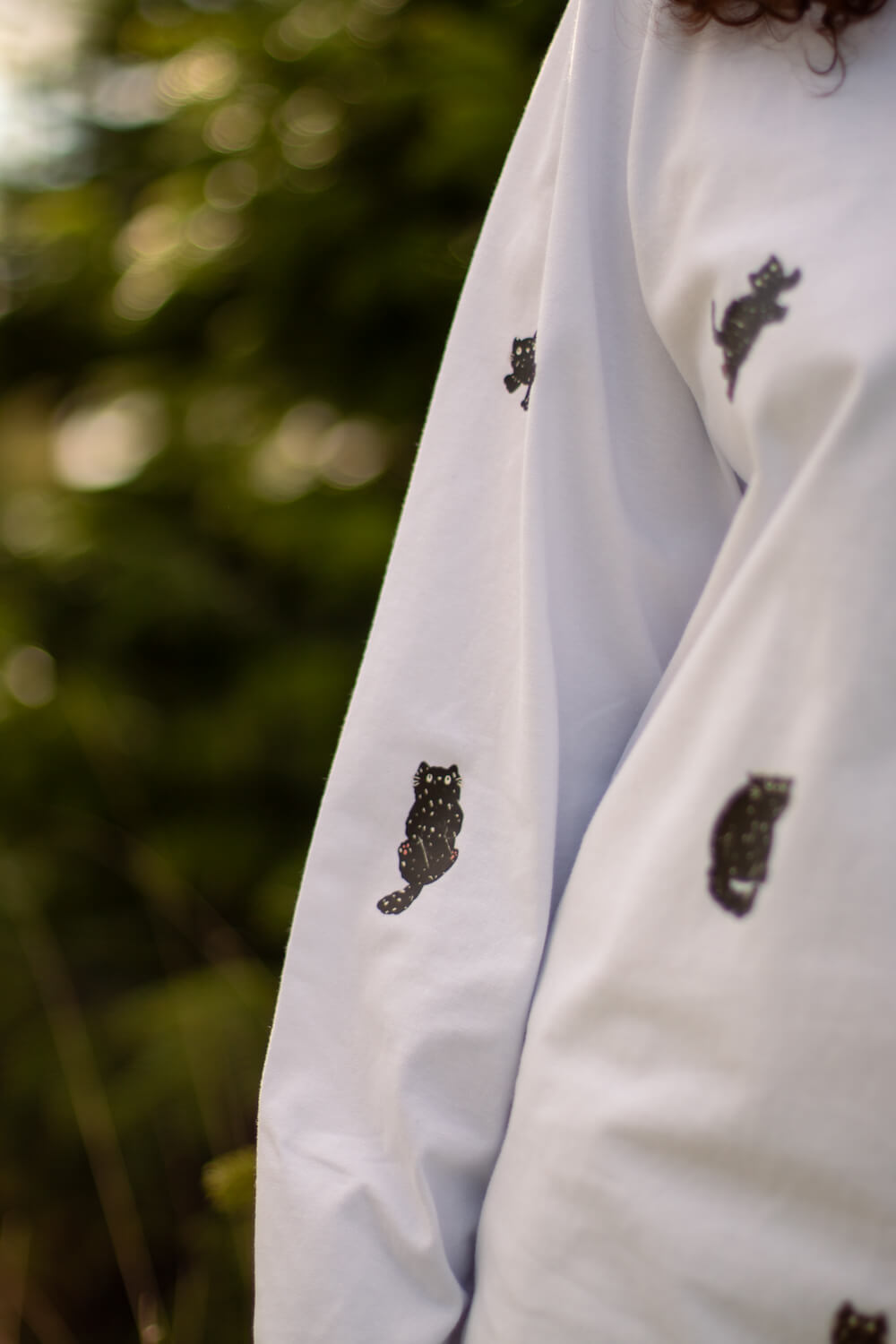 Snowy cats oversized top