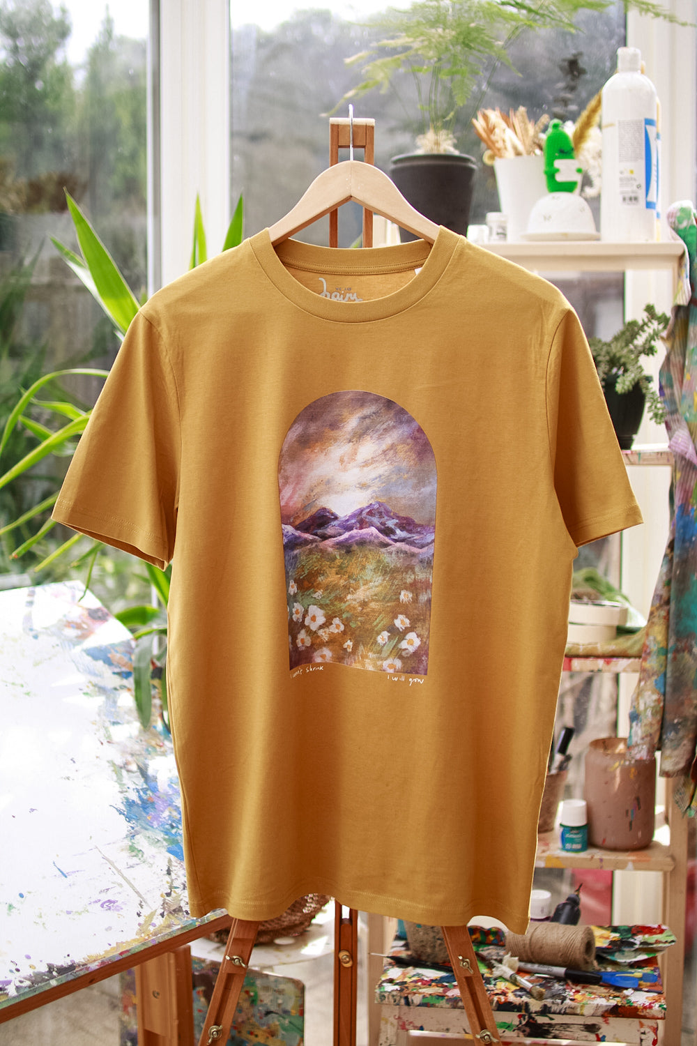 Growing in a wild landscape T-shirt