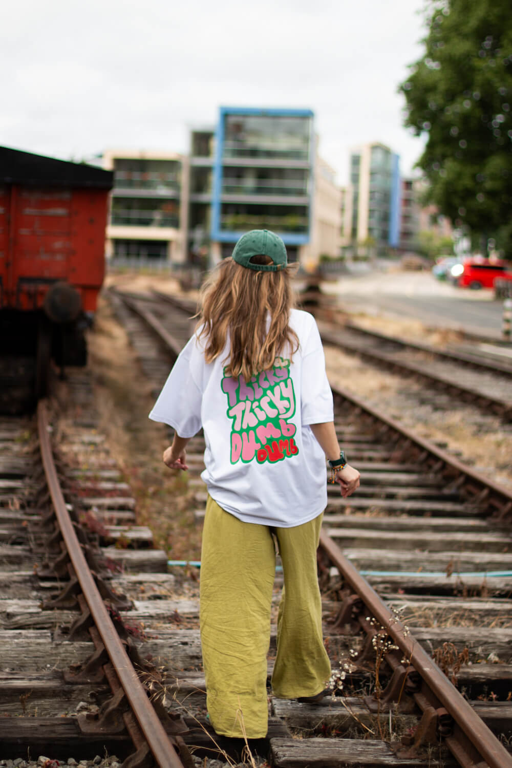 Thicky Thicky Dumb Dumb, Cody Dahler | Oversized Unisex Tee in White